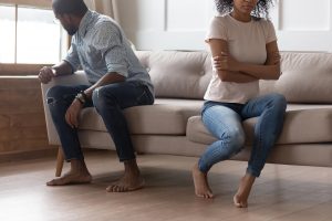A couple appear upset as they sit away from one another. A therapist in Arcadia, AZ can help create healthier boundaries. Learn more about therapy in Arcadia, AZ or trauma therapy in Arcadia, AZ by contacting a therapist in Arcadia, AZ today.